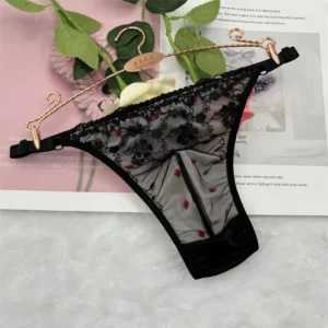Lingerie transparente homme - string noir en dentelles brodées